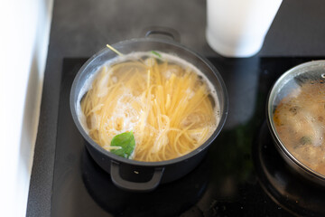 cooking, spaghetti in pot, boiling