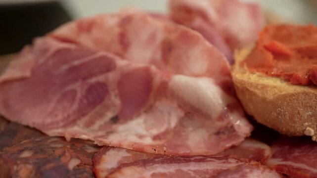 Traditional Italian charcuterie board with assorted cured meats and rustic presentation