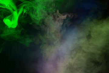 Green steam on a black background.