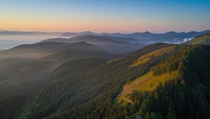 Sunrise view over mountainous terrain from above