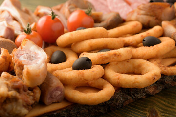 assorted pork meat on a wooden bottom