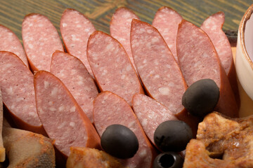 assorted pork meat on a wooden bottom