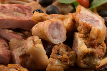 assorted pork meat on a wooden bottom