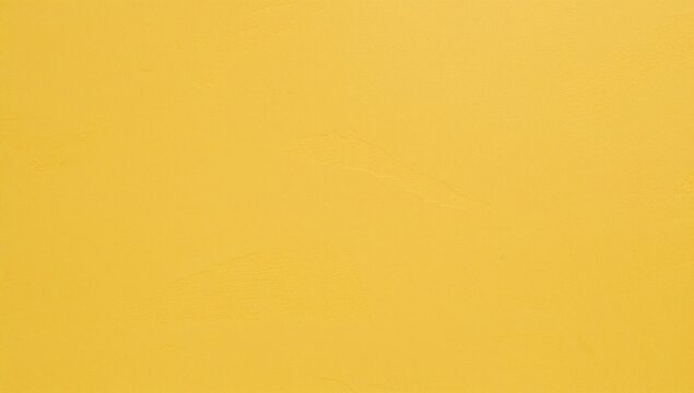 Smooth plain yellow painted wall texture as seamless background