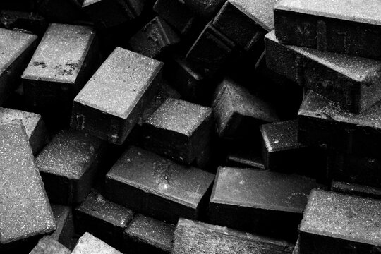 Bricks, mountain of bricks, black and white background - Powered by Adobe