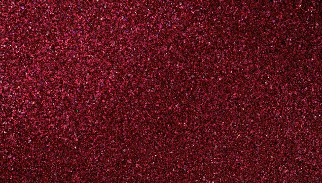 Close-up of a dark red sparkling background created by small sequins, suitable for editorial header background