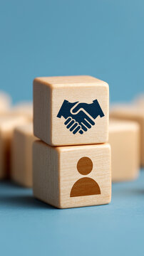 Business Partnership and Collaboration Concept with Handshake Icon on Wooden Cube, Networking, Agreement, Teamwork and Connection Symbol, vertical bg