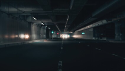 Inside a city tunnel void of vehicles viewed from street level - shallow focus and glowing light effects