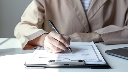 Business woman employer holding resume hiring recruit looking cv resume to hire candidates,...