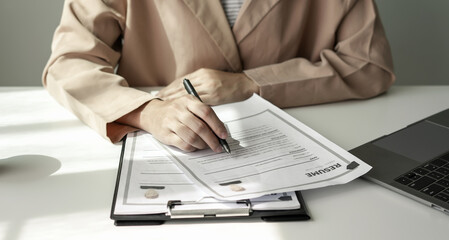 Business woman employer holding resume hiring recruit looking cv resume to hire candidates,...