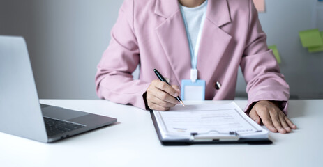 Business woman employer holding resume hiring recruit looking cv resume to hire candidates,...