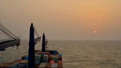 Container ship underway at sea in the morning