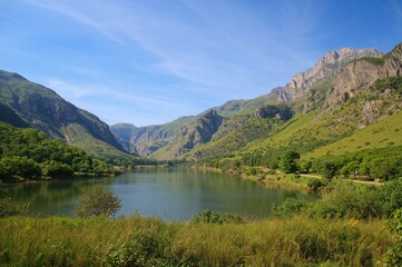 Fototapeta premium Scenic valley view along the path to mountain lakes in northern Spain