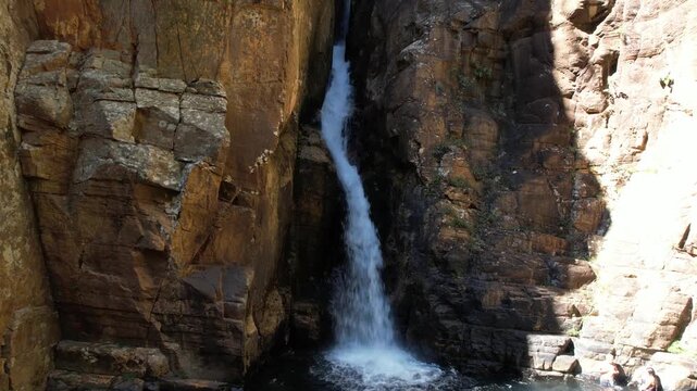 canyons and valley Guardian waterfall,  Vao do Moleque community in Chapada dos Veadeiros,  blue water, sunny day, incredible landscape