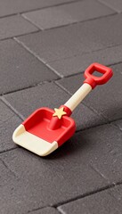 Cute snow shovel 3D toy with star sticker minimal design red cream color tone isolated concept