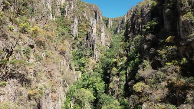 canyons and valley Guardian waterfall,  Vao do Moleque community in Chapada dos Veadeiros,  blue water, sunny day, incredible landscape