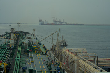 Cargo operation in progress in a Tanker ship at port