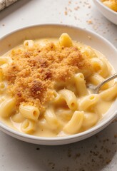 creamy bowl of mac and cheese with a golden crust