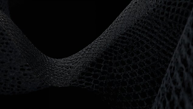 Macro shot of a flexible black lattice with an abstract cellular pattern