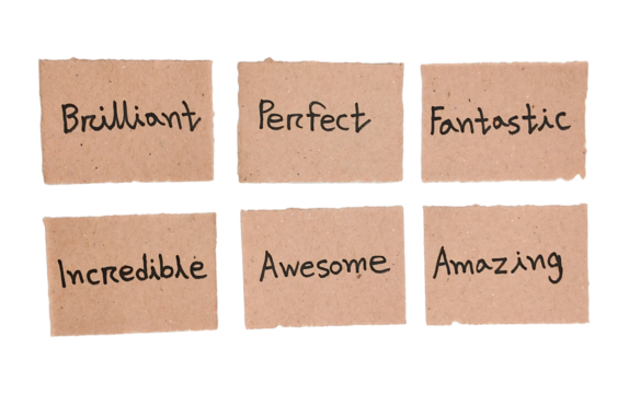 Handwritten Positive Adjectives and Compliments on Brown Cardboard Labels - Powered by Adobe