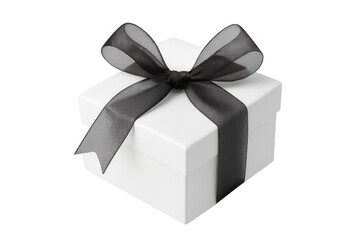 Fototapeta premium Gift box with black ribbon bow for special occasion gifting, birthday, christmas, or anniversary celebration concept