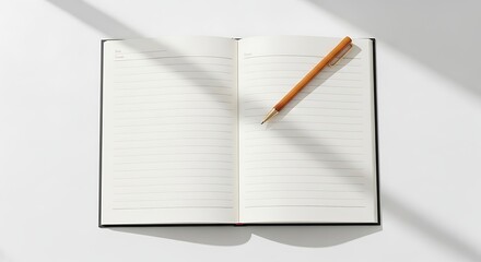 A top view of an open notebook with lined pages and a wooden pen placed on top on a white surface