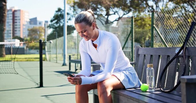 Tennis, sports and woman with phone for rest, break and online for workout app, social media and internet. Fitness, happy and person on smartphone for training, exercise update and practice for game