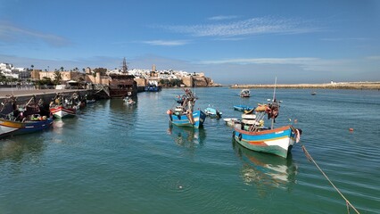 Obraz premium Traditional Fishing Boats Docked on the Bouregreg River in Rabat, Morocco – October 8,2025 