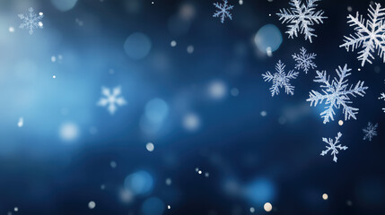 Winter blue gradient blurred background, with a few large white snowflakes in the foreground