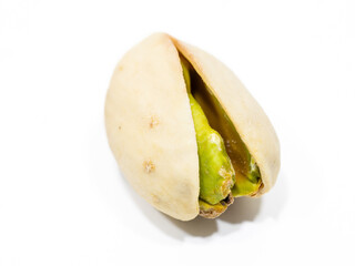 Heap of tasty pistachio nuts isolated on white background