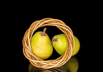 Sweet pear on black glass, macro.