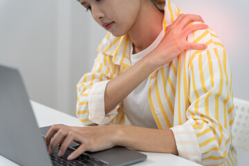 woman holding on shoulder and while and suffer from unbearable pain health and problems, chronic...