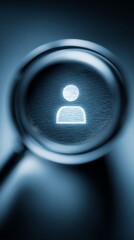 Focusing on the Individual: A magnifying glass hovers above a glowing, minimalist human icon. Representing the essence of personal identity, the scene evokes a sense of exploration, examination.