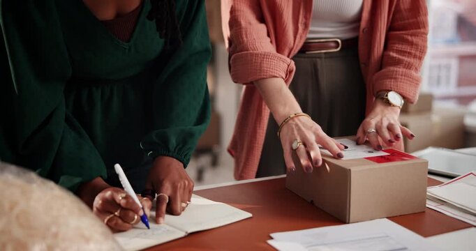 Hands, writing and team at dropshipping with package, book or checklist for inventory management with fashion. People, partner and small business with label for box, logistics or planning at store
