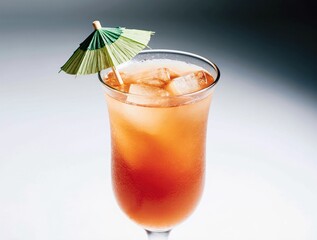 Refreshing tropical cocktail with ice and umbrella
