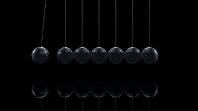 Kugelsto&szlig;pendel, eine Kugel st&ouml;&szlig;t an und eine wird abgesto&szlig;en