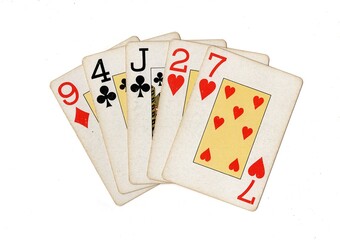 A hand of vintage playing cards isolated on a white background.