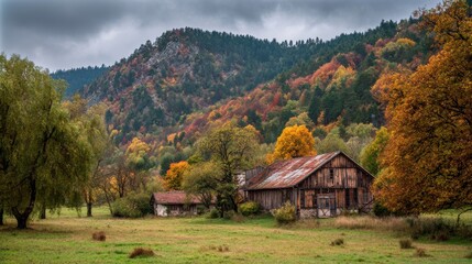 Old abandoned house in the countryside with autumn colors and cloudy sky