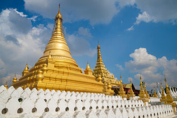  At the stupa of the Buddhist temple of Kuthodaw Pagoda on a sunny day. Mandalay, Myanmar