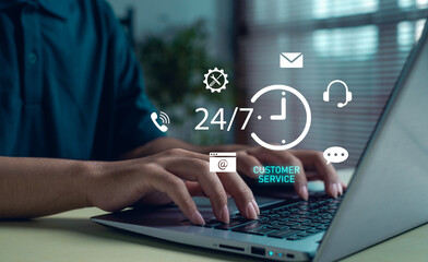 Customer service support 24-7 concept with business person typing on laptop. Icons of communication, headset, email, and chat represent online assistance and digital helpdesk technology.
