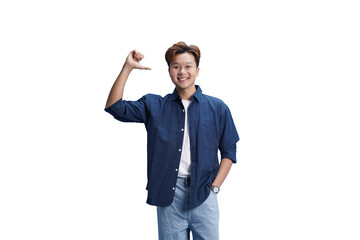 Confident Youth in Denim: A cheerful young individual poses with confidence, showcasing an...
