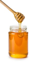 Jar of golden honey with wooden dipper isolated on white background, natural sweetness concept