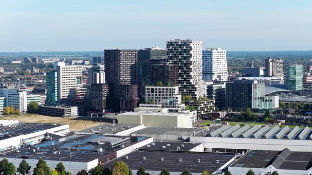 Utrecht, Utrecht, the Netherlands - 10th of October 2025; Center of Utrecht with the Rabobank Administrative Center, the Dom in the background from the air