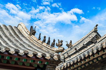chinese temple roof with blue sky