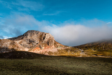 mountain landscape with blue sky and clouds