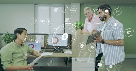 Three coworkers discussing financial data on printed report and tablet in office, data overlay