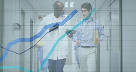 Walking doctors in white coat holding tablet yellow folder in hospital hall with stethoscope graphs