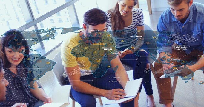 Brainstorming five professionals analyzing global data in meeting space, with digital map overlay