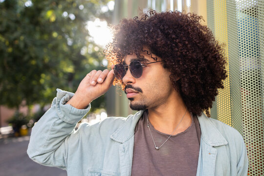 Stylish man embraces urban life with flair