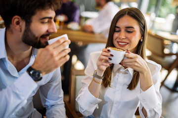 Couple drinking coffee in cafe